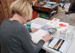 Private art lesson donated by Susan Carter and won by Sue Barrowcliffe